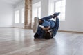 Young male dancer in fashionable denim dress dancing in studio Royalty Free Stock Photo