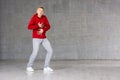 Young male dancer on grey background. Royalty Free Stock Photo