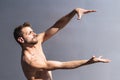 Young male dancer shows his hands dance motion Royalty Free Stock Photo