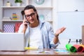 Young male designer working in the office Royalty Free Stock Photo