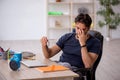 Young male designer working in the office Royalty Free Stock Photo