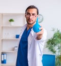 Young male doctor gastroenterologist working in the clinic