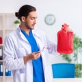 Young male doctor gastroenterologist working in the clinic