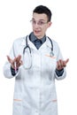 Young male doctor with glasses gesturing and looking at the camera.