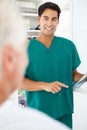 Young male doctor with senior patient Royalty Free Stock Photo