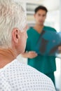 Young male doctor with senior patient Royalty Free Stock Photo