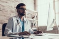 Young Male Doctor Working with Computer in Office Royalty Free Stock Photo