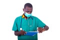 Young male doctor writing notes on clipboard Royalty Free Stock Photo