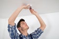 Electrician Repairing Smoke Detector Royalty Free Stock Photo