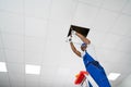 Electrician Installing Light On Ceiling Royalty Free Stock Photo