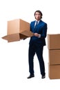 Young male employee with boxes isolated on white Royalty Free Stock Photo