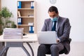 Young male employee wearing mask during pandemic Royalty Free Stock Photo