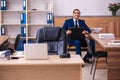 Young male employee working in the office Royalty Free Stock Photo