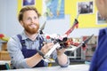 young male engineer programs drone Royalty Free Stock Photo
