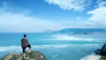 Young male enjoying turquoise water scenery