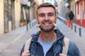 Young male faking smile with clothespins Royalty Free Stock Photo