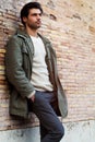 Young male fashion street on wall Royalty Free Stock Photo