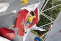 Young male and female competitors in the Madrid Block Climbing Spain Cup held at Madrid`s Plaza de EspaÃÂ±a. Climbers. Olympic.