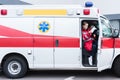 young male and female paramedics sitting Royalty Free Stock Photo
