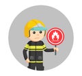 Young male firefighter standing with fire sign