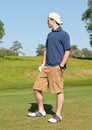 Young Male Golfer Looking over Fairway Royalty Free Stock Photo