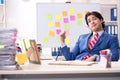 Young male handsome employee in conflicting priorities concept Royalty Free Stock Photo