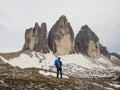 Young male hiker at alpine mountain panorama of Tre Cime di Lavaredo in Sexten Dolomites South Tyrol Italy alps Europe