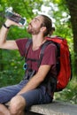 young male hiker drinking water Royalty Free Stock Photo