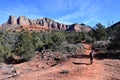 Young male hiker on hiking trail in red rock country near Sedona, Arizona.