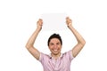 Young male holding a blank page over his head Royalty Free Stock Photo