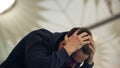 Young male holding head, suffering from hangover after night party, vomiting Royalty Free Stock Photo