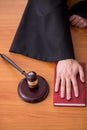 Young male judge working in the courtroom