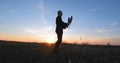 Young male kung fu fighter practising outdoors