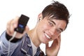 Young male listening mp3 music and shows player