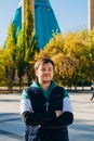 Young male man on Muslim Mosque and yellow trees. Lifestyle portrait of european white caucasian unshaven beard adult man. Royalty Free Stock Photo