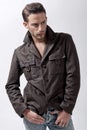 Young male model with brown jacket Royalty Free Stock Photo