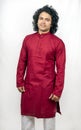 Young male model wearing red kurta