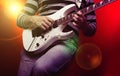 Young male musician with a white guitar Royalty Free Stock Photo