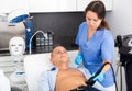 Man getting ultrasound procedure for body contouring Royalty Free Stock Photo