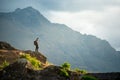 Young male photographer looking at scenery in Queenstown Royalty Free Stock Photo