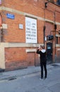 Young Male Photographing famous Mosaic in Manchester