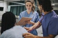 Young male physician examining a patient Royalty Free Stock Photo