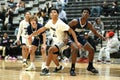 Young male players on the court at a fall Merrillville high school basketball game Royalty Free Stock Photo