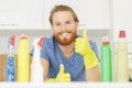 young male professional cleaner with thumb up Royalty Free Stock Photo