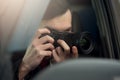 Close-up - Young Man Photorapher Sitting In The Car