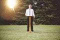 Young male standing near a wooden speech stand- perfect for oratory, speech, lecturing concepts