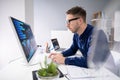 Businessman Analyzing Graph On Computer Royalty Free Stock Photo