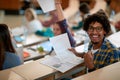 Young male student happy about his scores of the exam