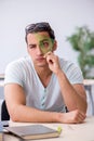 Young male student preparing for exam in the classroom Royalty Free Stock Photo