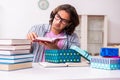 Young male student preparing for exams during Christmas Royalty Free Stock Photo